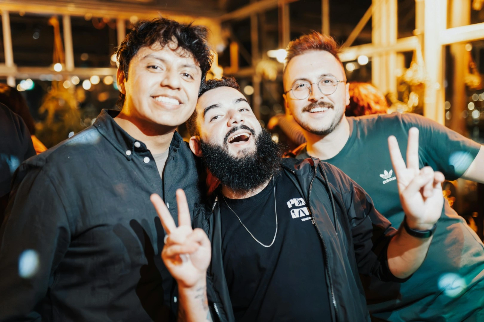 People laughing candidly at a club evening